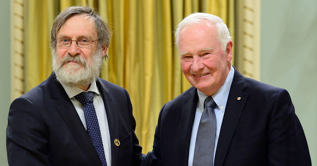 Professor Leonard Maler shaking hands with The Right Honourable David Johnston, former Governor General of Canada