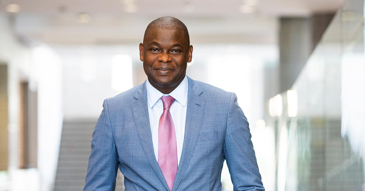 Sanni Yaya, Vice-Presidentnternational and Francophonie, posing in a blue suit