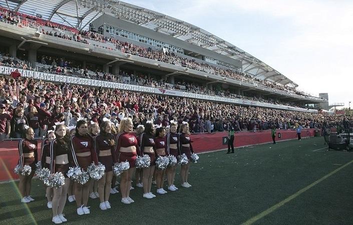 Gee-Gees cheerleaders standing in formation.
